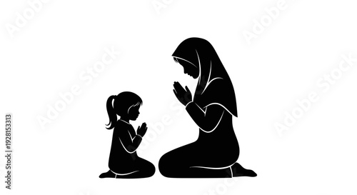 Mother and daughter praying together in silhouette.