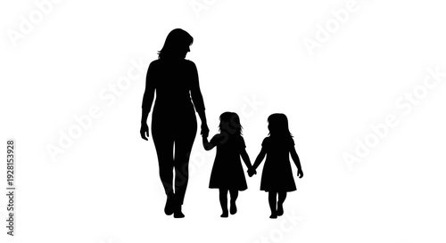 Silhouette of a mother walking with her two daughters holding hands together.