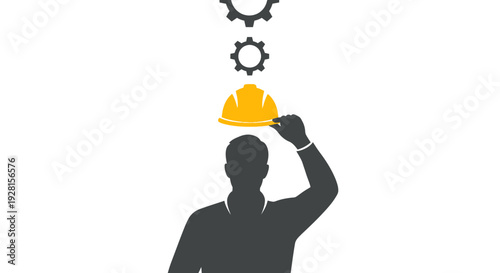 Man holding yellow hard hat up.