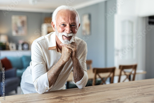 Smile, portrait and senior man alone in retirement. Relax, retired and elderly happy male in house, thinking and happiness with lifestyle, confidence and positive mindset.
