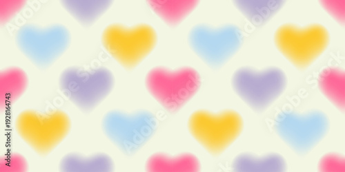 Seamless pastel pattern with soft mesh gradient hearts in pink, blue, yellow and lilac on a light background. Dreamy blurred texture, perfect for fabric, wallpaper, wrapping paper and stationery.