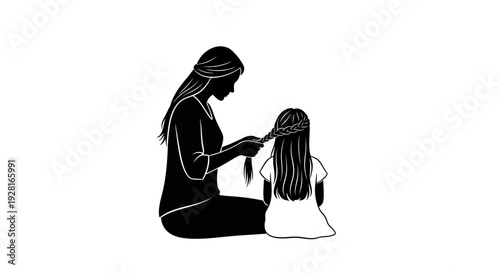 Mother combing her young daughter's hair in a tender moment.