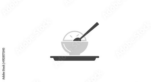 Simple ceramic bowl with spoon.