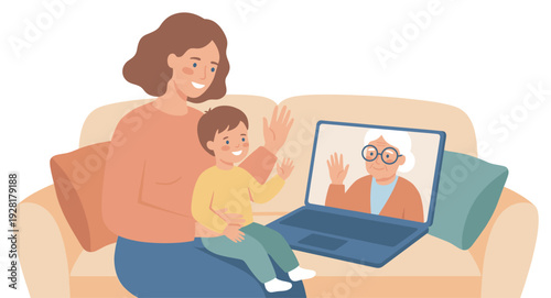 Smiling young mother and her son are sitting on a sofa and waving during a happy video call with their grandmother on a laptop, connecting with family from a distance