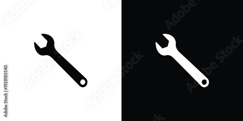 Black and white adjustable wrenches on split color background tools split background silhouettes
