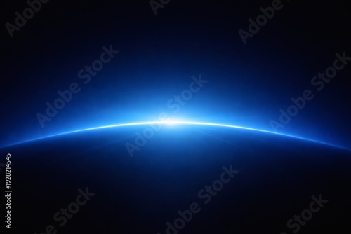 Sunrise over the curved horizon of a planet with a radiant blue glow illuminating the surroundings in the vastness of space with a striking contrast of light and shadow.