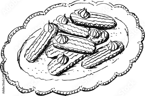 plate of eclairs with cream topping pastry dessert selection on decorative dish