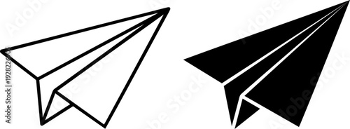 Paper airplanes in flight with black and white designs