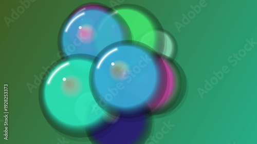 A vibrant cluster of colorful transparent spheres on a stem against a green background from a close-up viewpoint