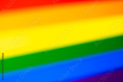 Colorful abstract background featuring blurred rainbow stripes representing diversity, inclusivity, and positivity. Ideal for marketing, design, and social campaigns promoting equality and unity.