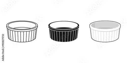 Three ramekins or small ceramic baking dishes in different colors on white background for cooking and baking