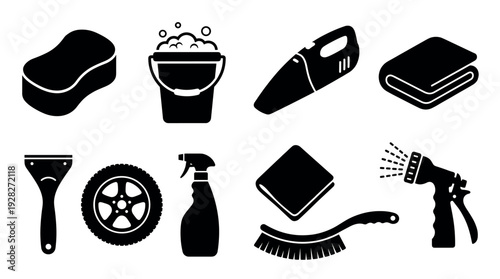 Black car washing and detailing icons set including a sponge, bucket, vacuum, towel, scraper, wheel, spray bottle, brush, and hose nozzle in a simple glyph style for vehicle care