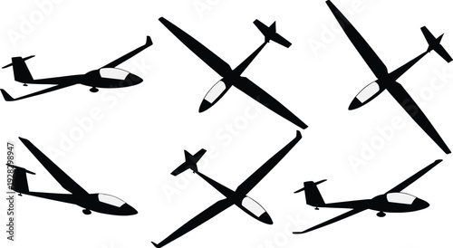 Black silhouettes of six gliders flying in different directions airplanes white background