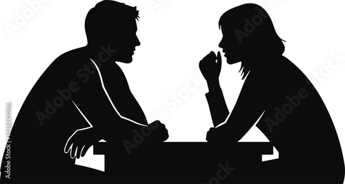 Silhouette of a man and woman sitting at a table, engaged in a conversation, with the woman touching her chin thoughtfully