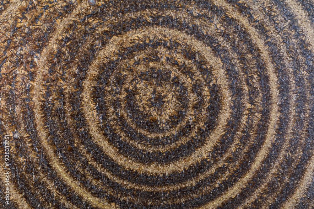 Fototapeta premium Abstract concentric rings creating a textured radial pattern
