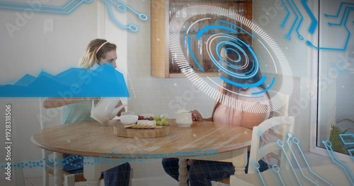 Pouring tea at home, left blue headband, right pink top, with white teapot, AR overlays