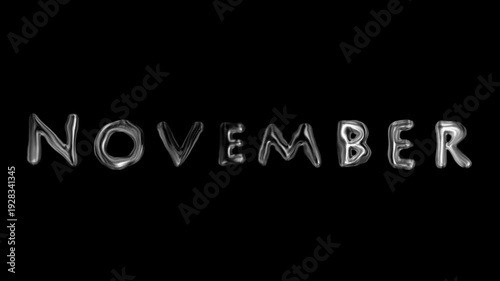 Silver November Text on Black Background.
