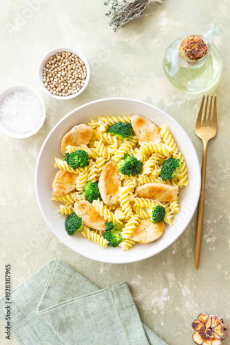 Pasta with chicken and broccoli in a creamy sauce. Italian cuisine.