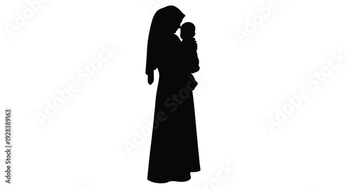Mother lovingly cradling baby in a striking black silhouette