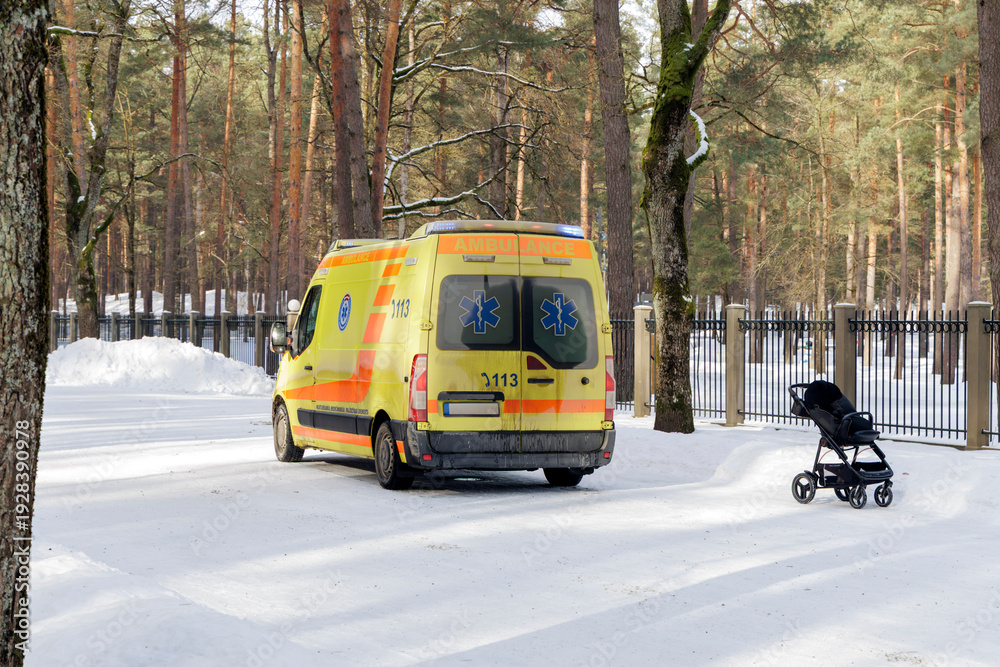 Obraz premium Ambulance and Baby Stroller in Winter Park