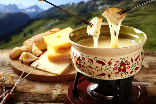Delicious traditional cheese fondue with bread in alpine setting
