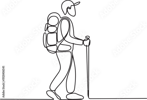 Man hiking with backpack and trekking pole in outdoor landscape viewed from the side