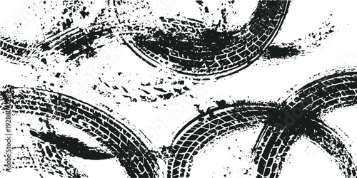 Black tire tracks and splatter on white background