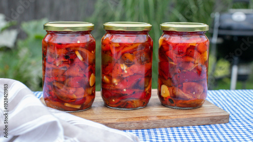 Photos Jars of vibrant pickled peppers whisper savory sonnets of preservation, echoing