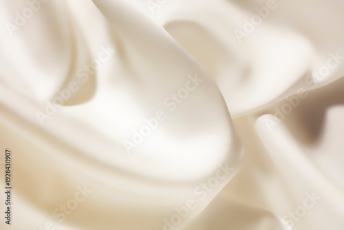 Fotografie Cosmetic beauty product silky cream texture beige creamy white colored backgroun