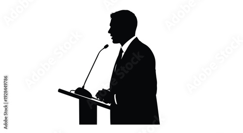 Silhouette of a man speaking at a podium against a white background