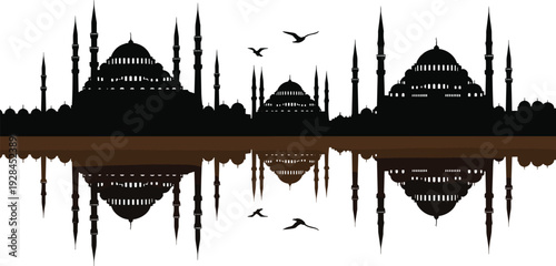 Beautiful black silhouette skyline of a traditional grand mosque with tall minarets reflecting perfectly in calm water with flying birds.