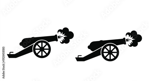 Two antique cannons firing depicted in a striking silhouette