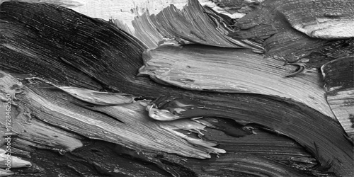 A closeup of old tree bark and a textured trunk with roots reveals an abstract nature pattern in a sepia landscape of gray wood and rock