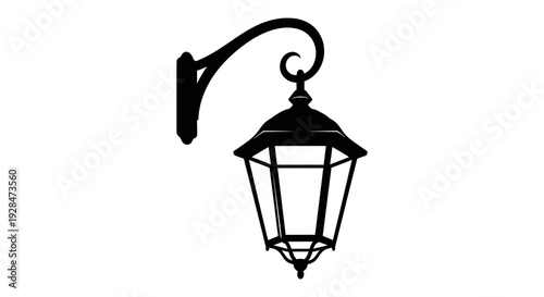 Black silhouette of an ornate outdoor wall mounted lantern on a white background