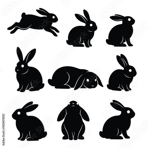 Dynamic black silhouettes of rabbits in various playful and athletic poses Vector
