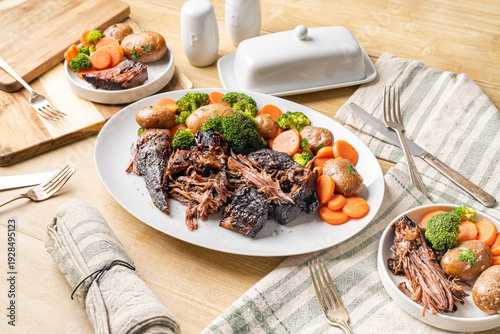 Obraz na plátně Hearty Midwestern food. Beef pot roast with carrots and potatoes