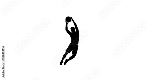 Silhouetted Athlete Jumping for a Volleyball