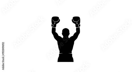 Silhouette of a Boxer with Gloves Raised in Victory Celebration
