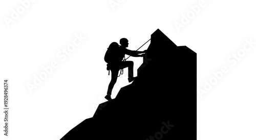 Silhouette of Climber Ascending Mountain Peak at Sunrise