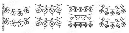 St Patricks Day decorative garlands with four leaf clovers and hearts