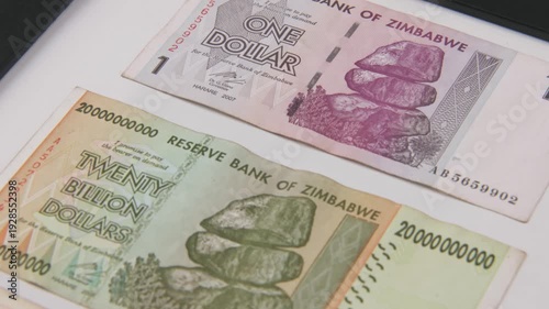 Close up of paper printed money in twenty billion, 200 thousand, and one dollar bill of Zimbabwe reserve bank inflated and inflation economy valueless moneys and poverty from 2020s in foreign value