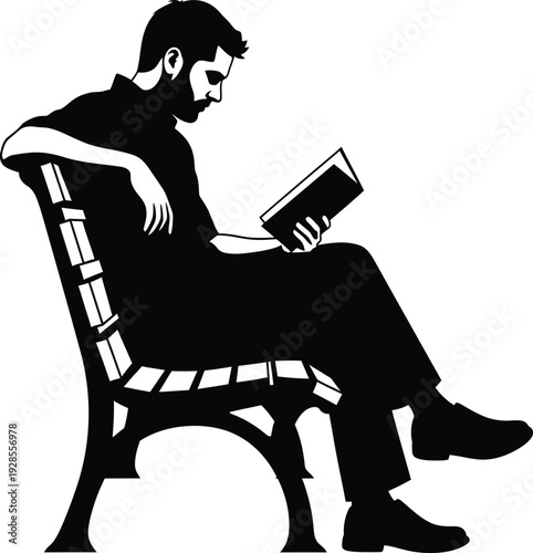Man sitting on a chair reading a book