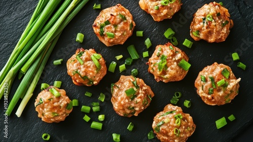 Pork Meatballs with Scallions on Dark Slate green onions