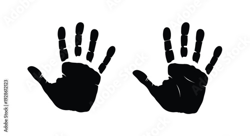 Two black hands facing each other against a white background a striking silhouette