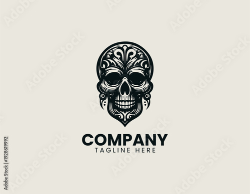 Detailed stylized skull with elongated jaw and earrings is presented as bold monochrome vector logo on clean white background