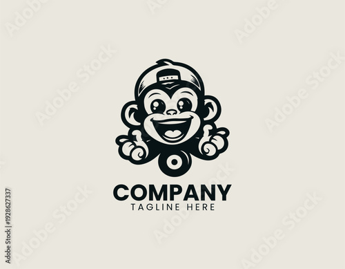 Playful cartoon monkey character with wide smile is presented as bold monochrome vector logo on clean white background