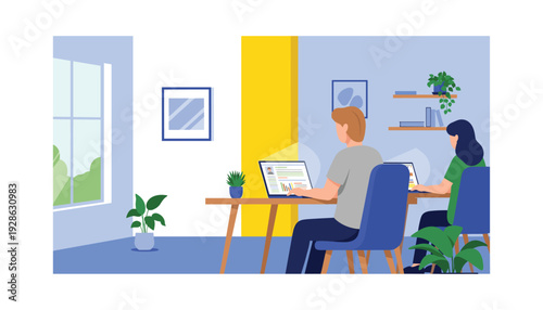 Colleagues working together on laptops in modern office space