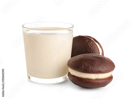 Bild auf Leinwand Delicious whoopie pies and glass of milk isolated on white background, closeup