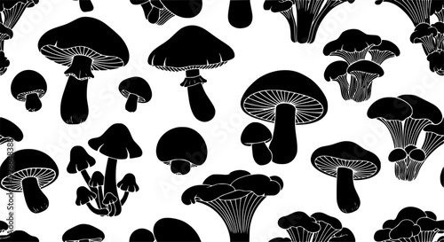 Seamless pattern of black mushroom silhouettes a white background
