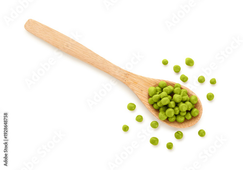 Spoon with green peas isola...